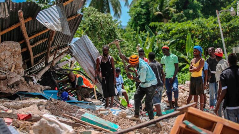 Haiti death toll rises as tropical storm hits earthquake zone