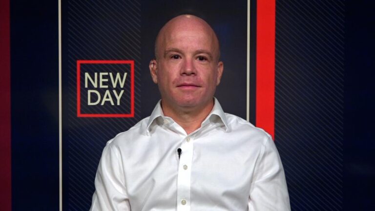 Dad threatened by anti-mask crowd says son has Covid-19