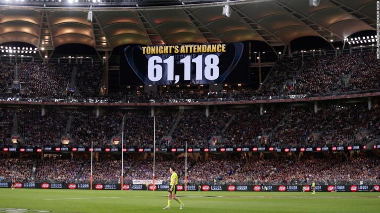 Covid surge after some Australians break lockdown to celebrate country’s biggest football event of the year