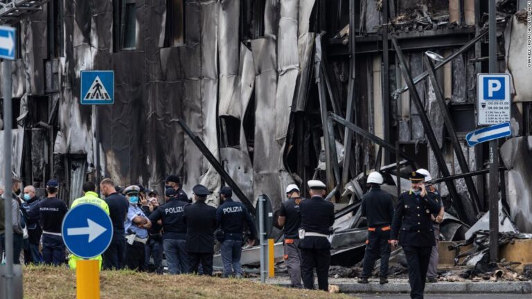 Small plane crashes into empty building outside Milan, all 8 onboard die