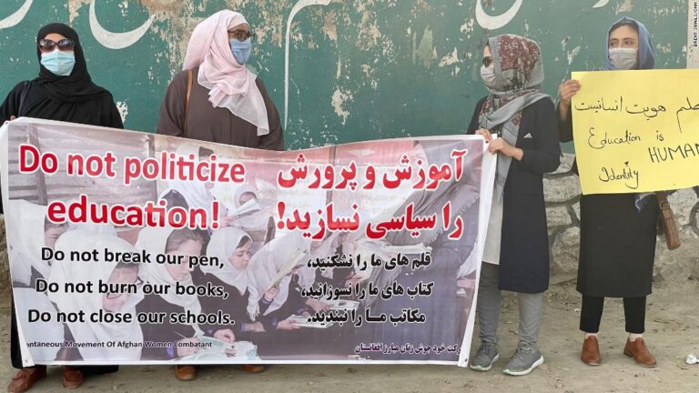Women in Kabul return to work, school and the streets, in defiance of the Taliban