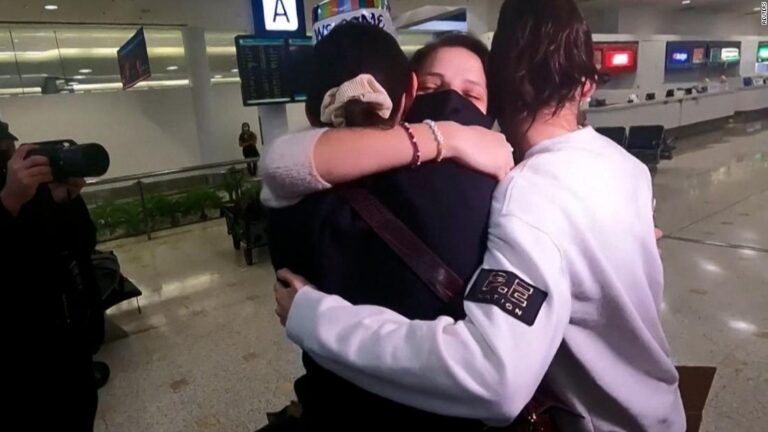 Tearful reunions as parts of Australia reopen border after 18 months