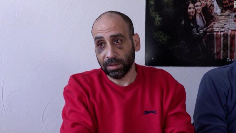 Refugee describes being kicked in the face by soldier