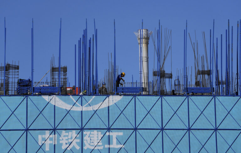 China’s economy slows as Beijing wrestles with debt