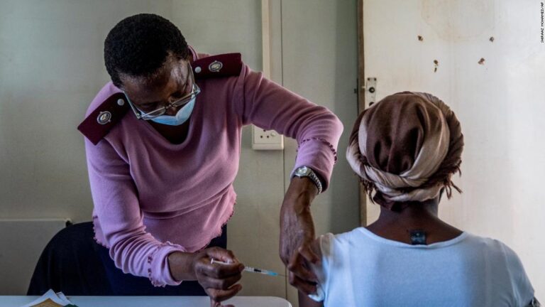 South Africa’s President urges people to get vaccinated as Omicron cases rise