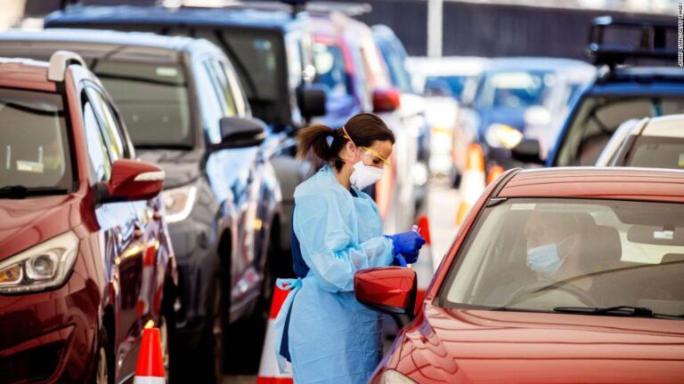 Australia moves to lift Covid-19 restrictions amid surge in Omicron infections