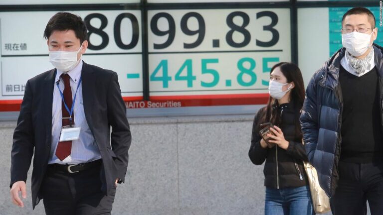 Stocks tumble and oil sinks as storm clouds gather over global economy
