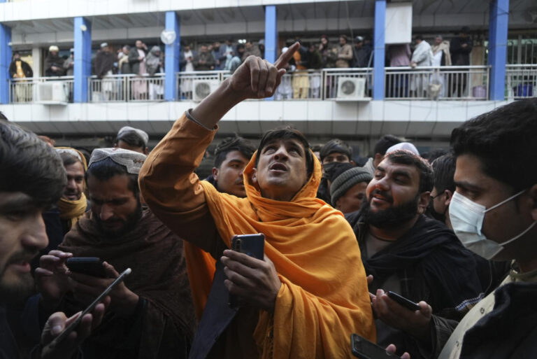 Afghan currency slides, prices surge as economy worsens