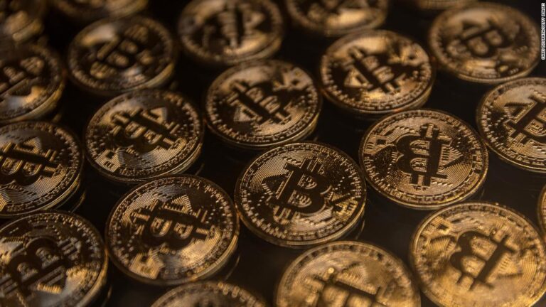 Bitcoin tumbles as cryptocurrencies continue their downward slide