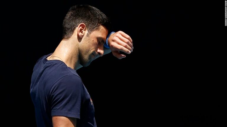 Djokovic trains as questions linger over eligibility to play in Australian Open