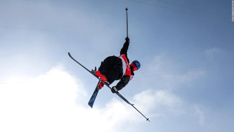 New Zealand’s Nico Porteous wins halfpipe gold as high winds send freeskiers tumbling