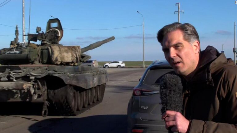Russian tanks roll past CNN reporter as they appear to head towards Ukraine