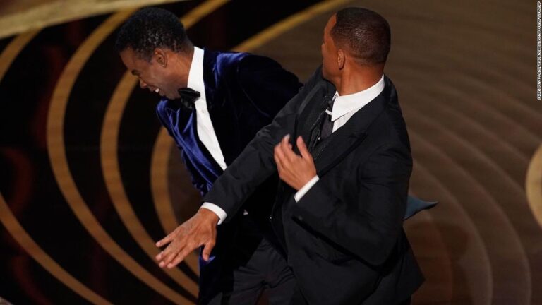 Will Smith hits Chris Rock on stage during Oscars ceremony