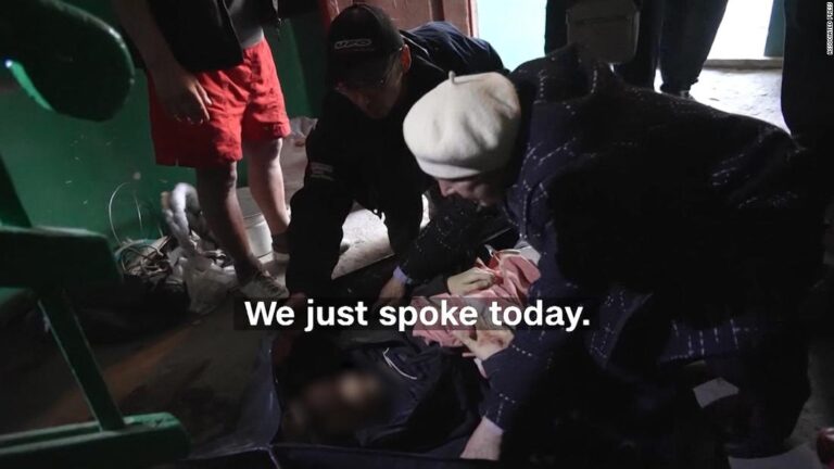 Ukrainian mom sobs over her 15-year-old before body is taken away