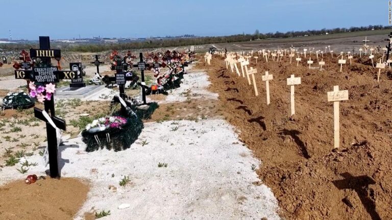 Workers struggle to keep up with burials of dead in Mariupol