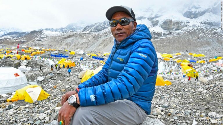 Nepali Sherpa breaks his own record again by scaling Everest 26 times, official says