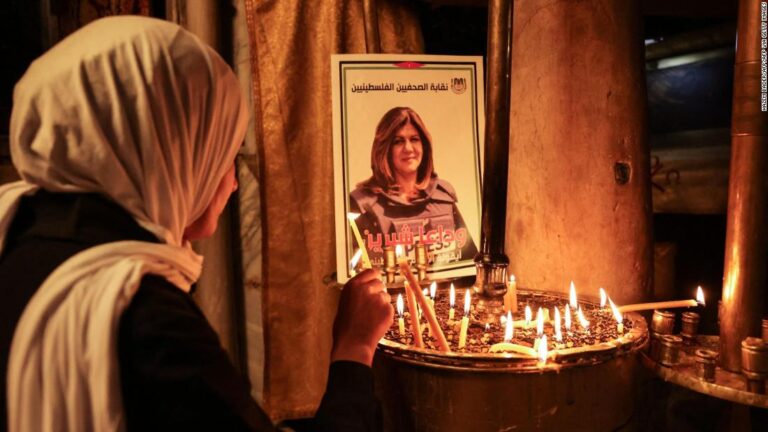 Thousands mourn slain journalist as Palestinians call for accountability