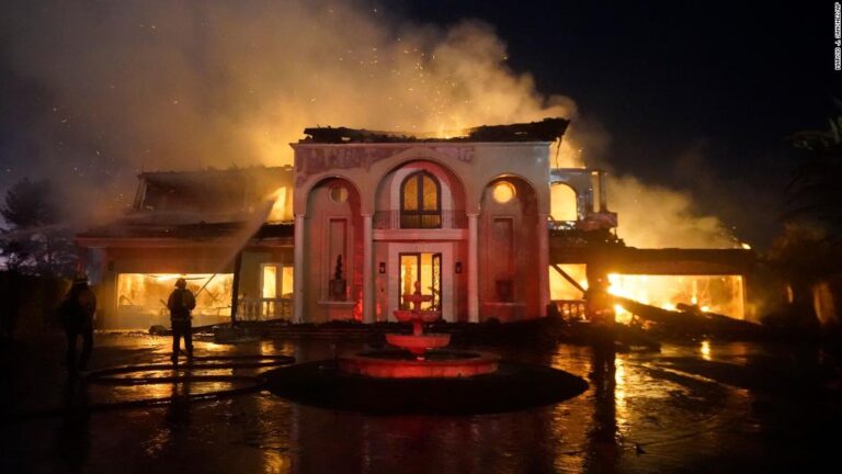 Hundreds in Orange County, California under evacuation orders as fire engulfs at least 20 homes