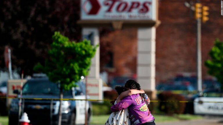 Witnesses describe horrors of mass shooting at a Buffalo supermarket that killed 10 people and authorities say was racially motivated