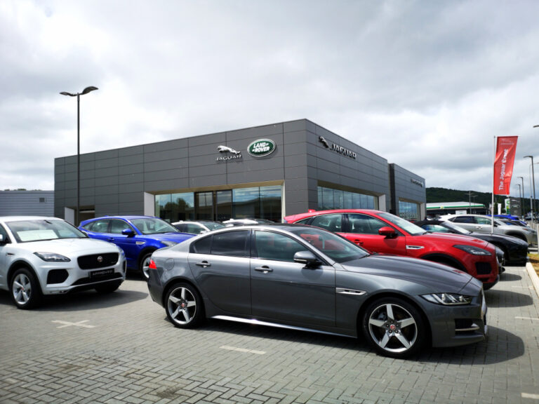 UK auto industry cuts 2022 outlook on supply snags, rising cost of living