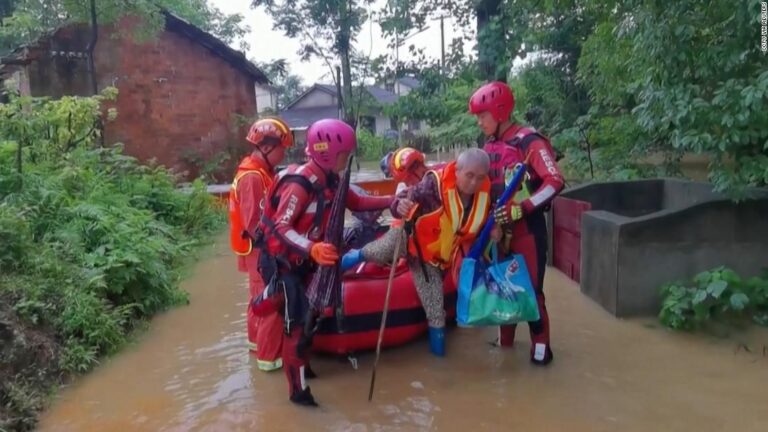 Baby among hundreds of thousands evacuated amid flooding in China