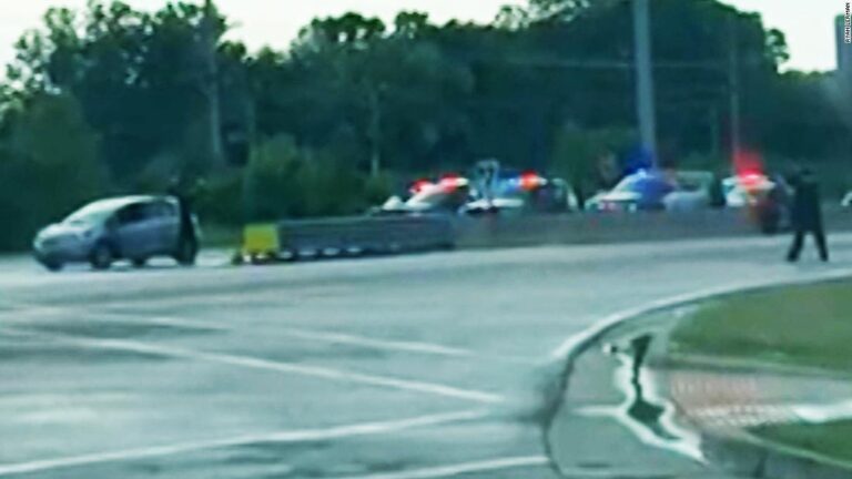 Video shows parade shooting suspect being taken into custody