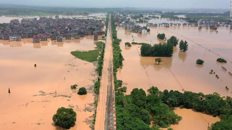 China reels from extreme weather as record rainfall and scorching heat wave cause havoc