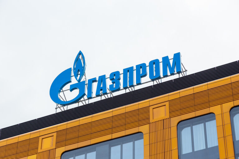 Volatile rouble slumps to 10-day low; Gazprom shares extend losses