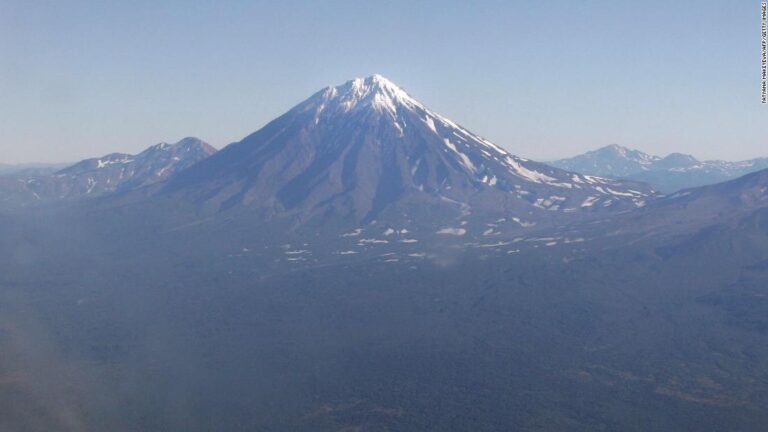 Rescuers search for survivors after eight die while trying to climb Russian volcano