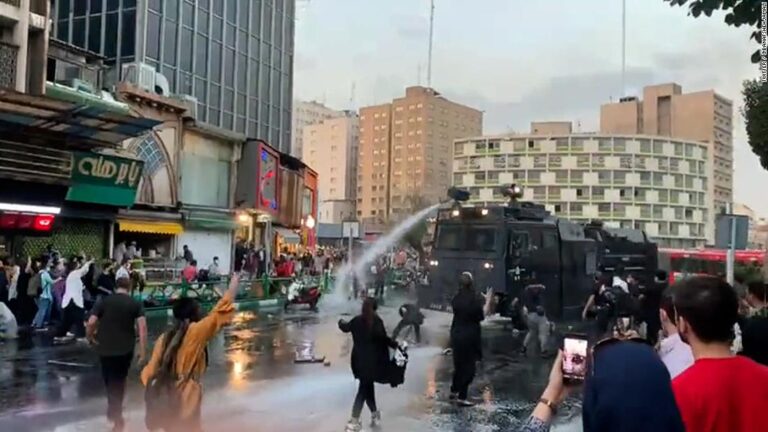 Video: Protesters remove head scarves in protest over woman’s death in police custody