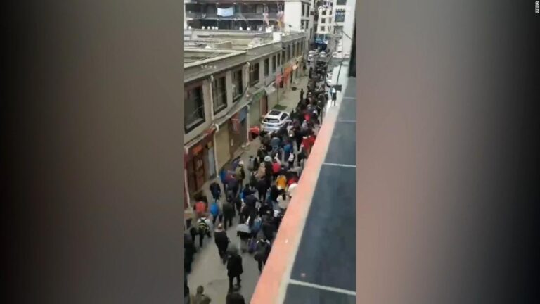 Video shows officials march residents off to quarantine camps in Tibet