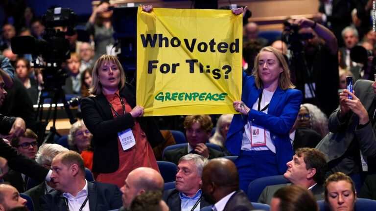 Greenpeace campaigners disrupt Liz Truss’s party conference speech