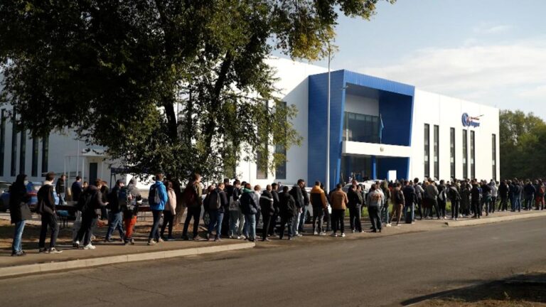 See Russians lining up to leave their homeland in defiance of Putin