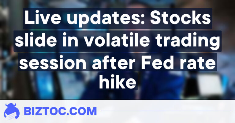 Live updates: Stocks slide in volatile trading session after Fed rate hike