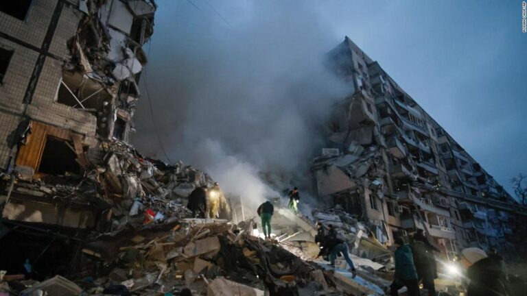 Russian strike destroys apartment building in Dnipro, killing at least 20 people, officials say